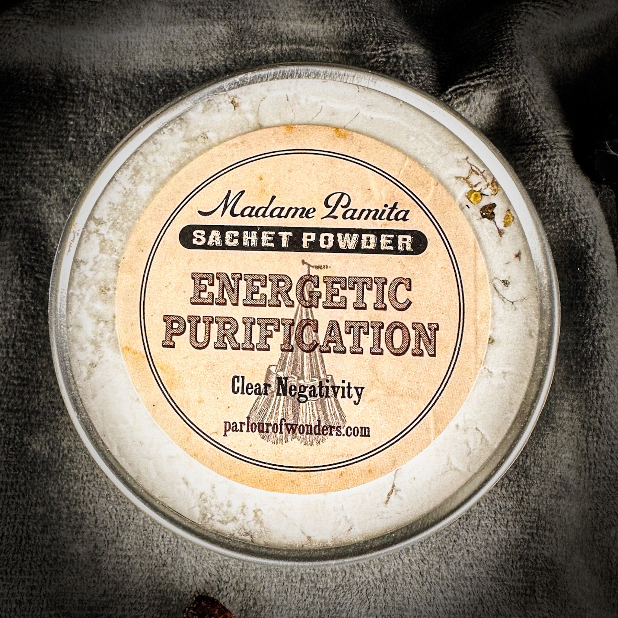 Energetic Purification Sachet Powder by Madame Pamita, brand Parlour of Wonders, shown in a small herbal powder packet.