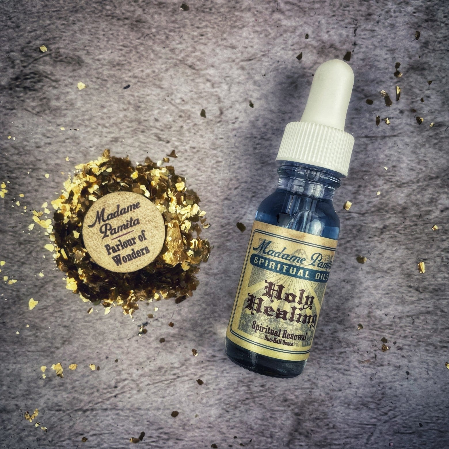 Holy Healing Oil by Madame Pamita, in a glass bottle with a dropper, used for spiritual and healing rituals.