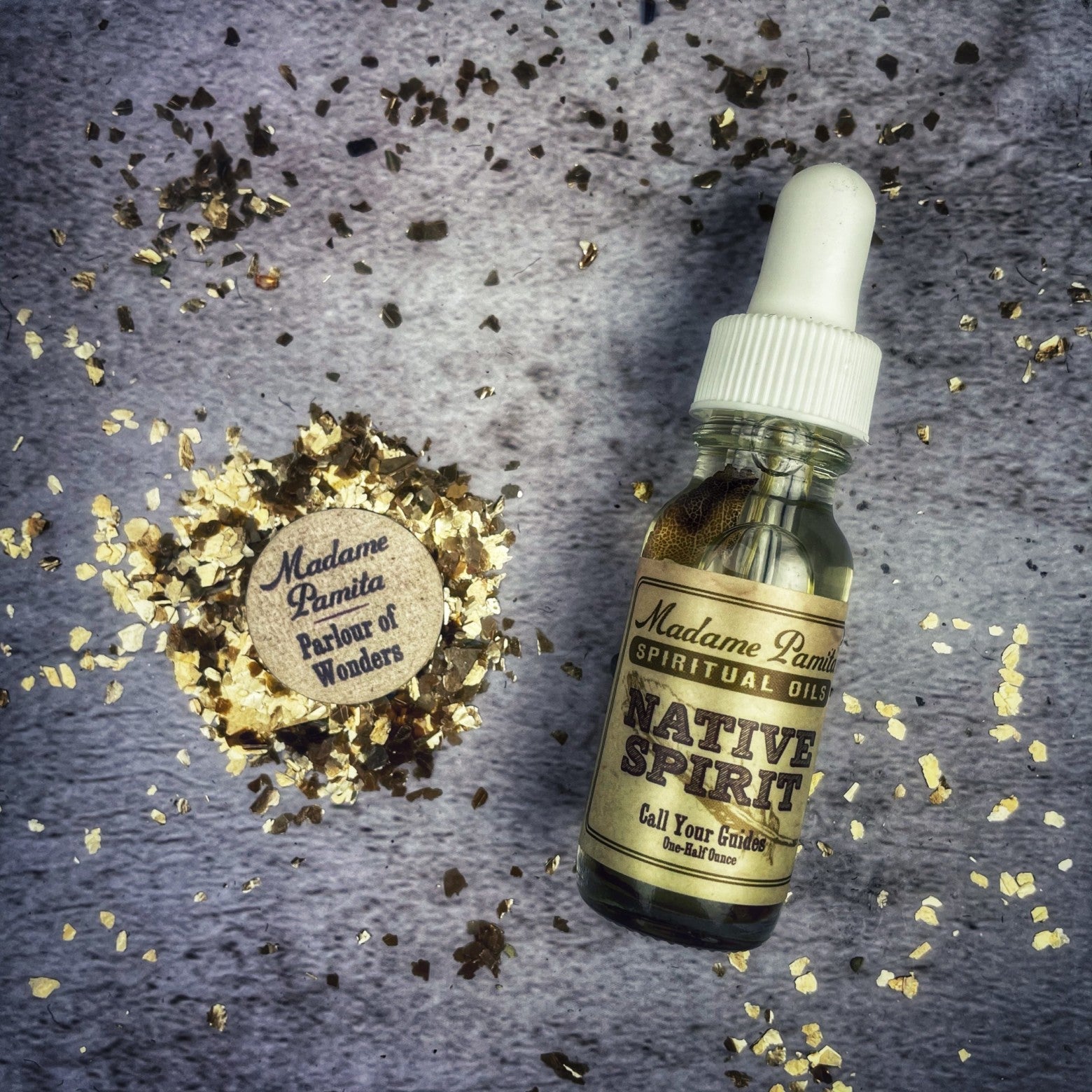 Native Spirit Oil by Madame Pamita from Parlour of Wonders, featuring a small bottle with Native Spirit Oil label and decorative background.