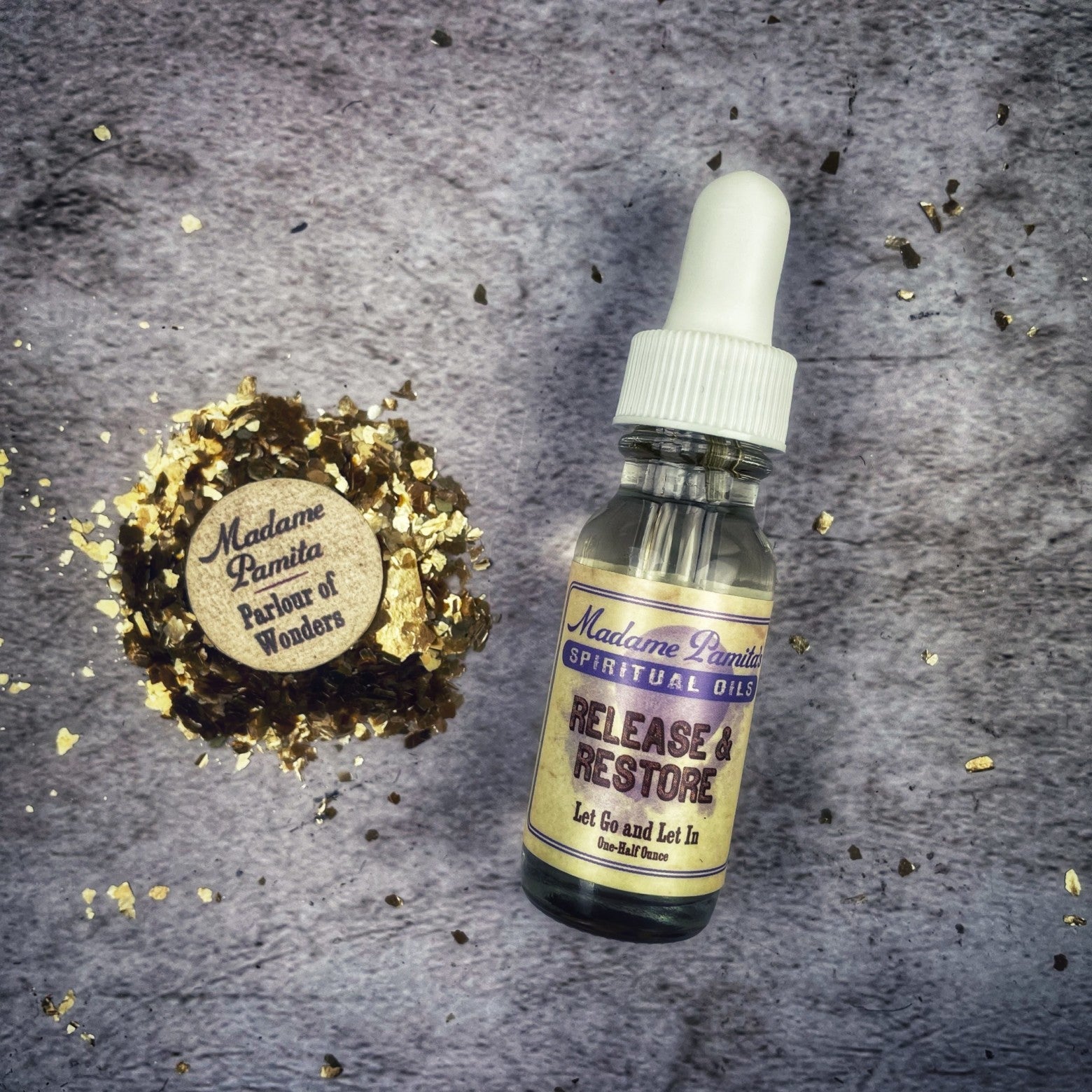 Release and Restore Oil by Madame Pamita from Parlour of Wonders, bottle of herbal oil with dropper for healing and relaxation.