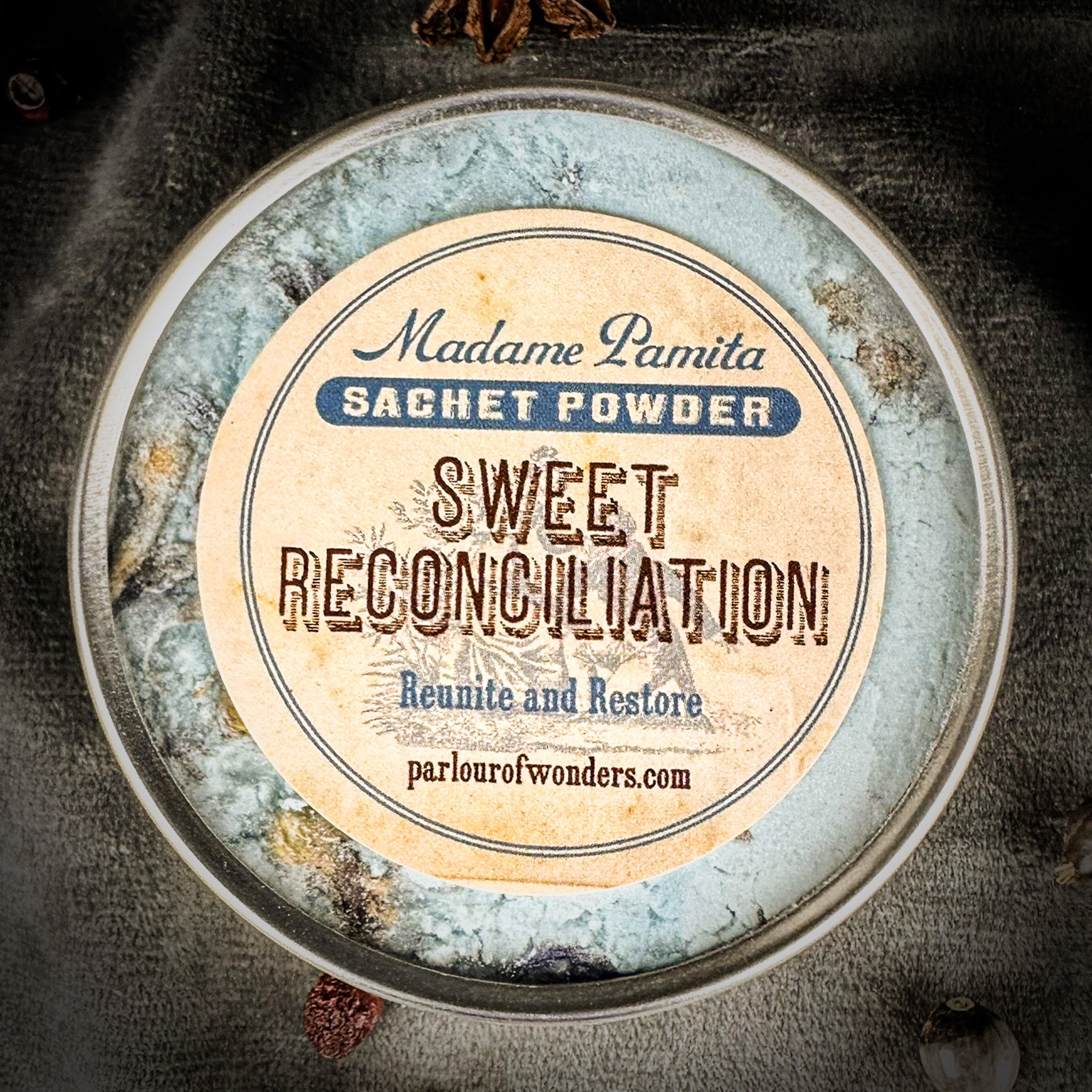 Sweet Reconciliation Sachet Powder by Madame Pamita from Parlour of Wonders, shown in a small, sealed sachet with decorative labeling.