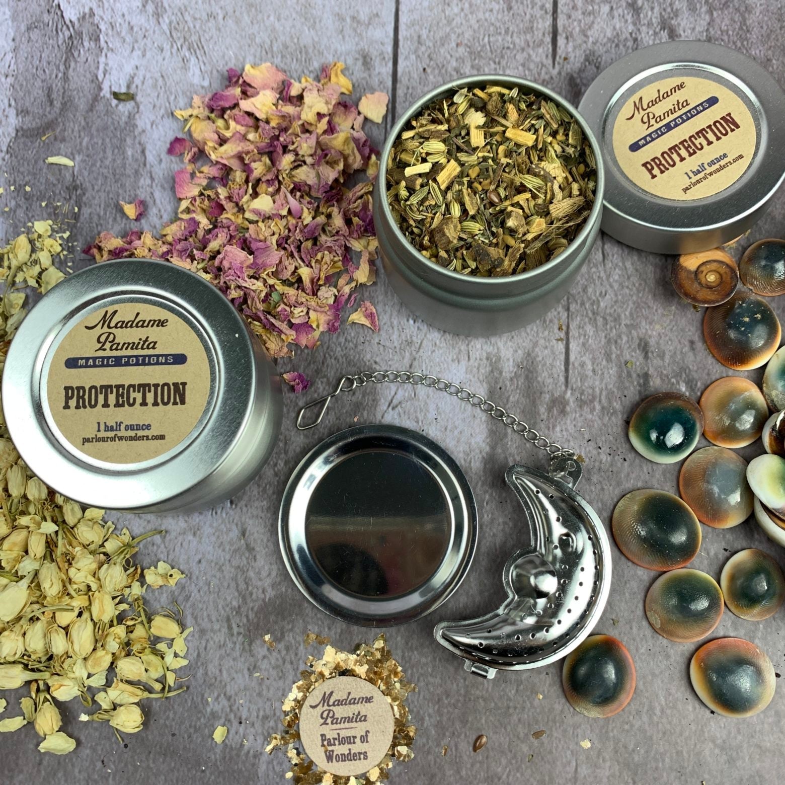 Protection Potion Spell Kit by Parlour of Wonders featuring a potion tin, moon infuser, and magical ingredients for spell casting.