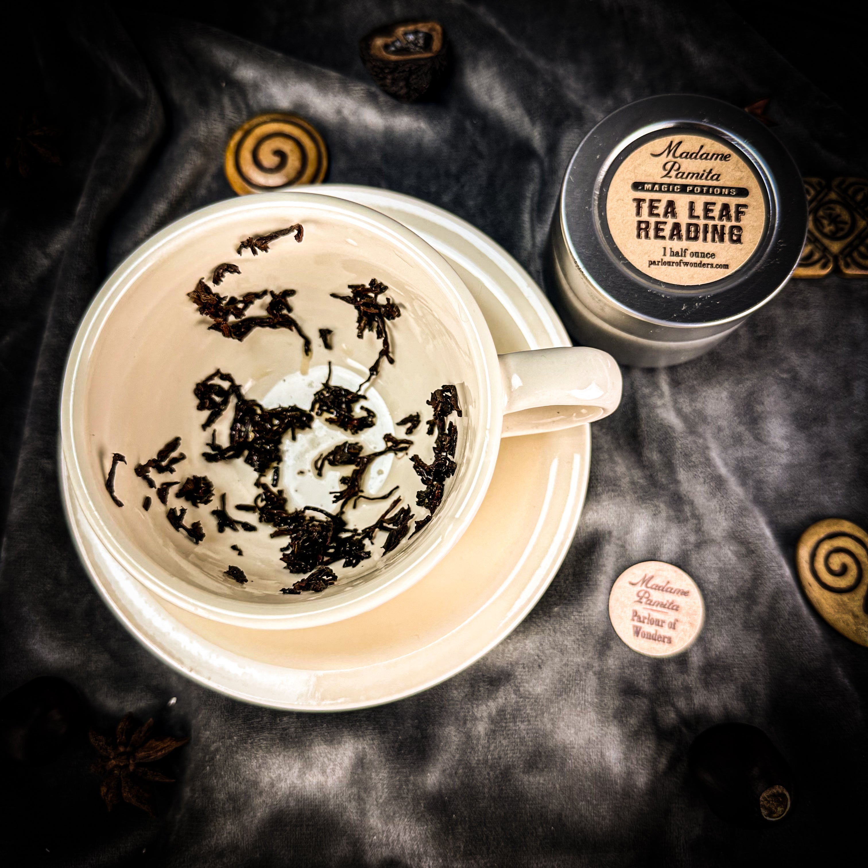 Deluxe Tea Leaf Reading Kit by Parlour of Wonders featuring tea leaves, reading tools, and instruction booklet for tea reading.