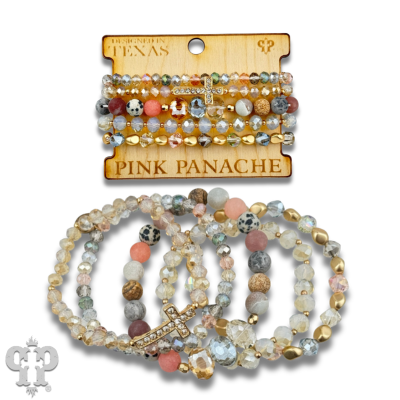 Pink Panache Brands faceted bead multi-strand bracelet stack with rhinestone cross, featuring blue beads and layered design.