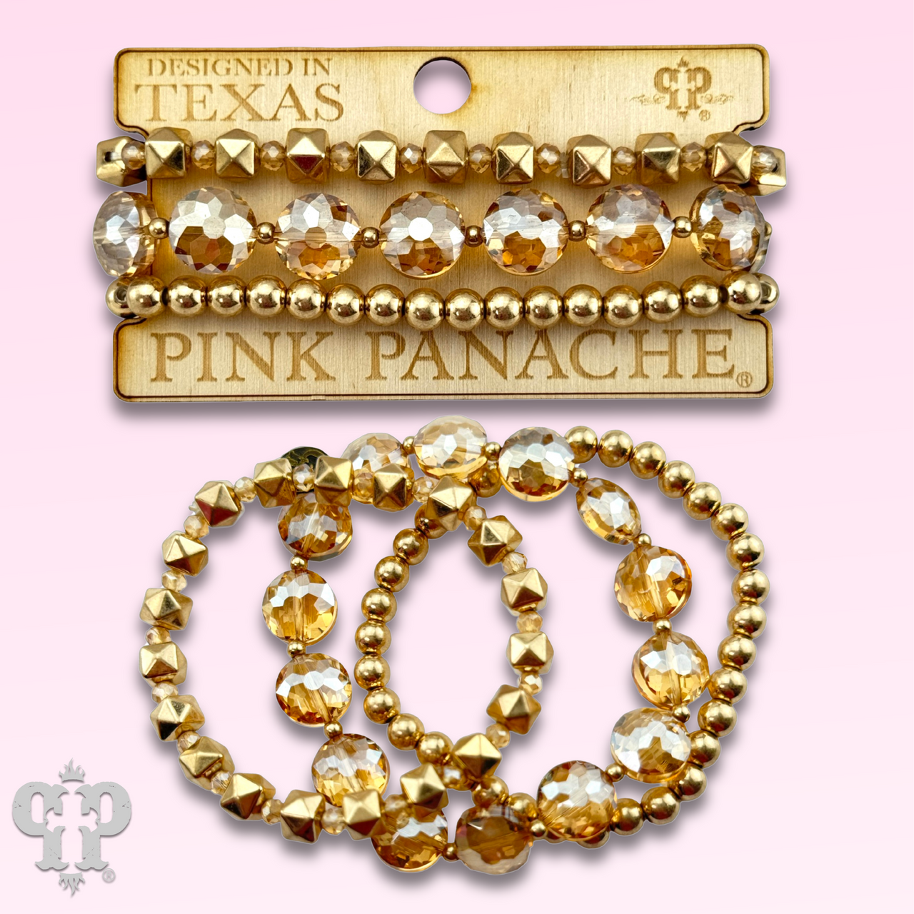 Gold and champagne bead bracelet featuring pink Panache Brands, showcasing elegant mixed-tone beads on a delicate bracelet.
