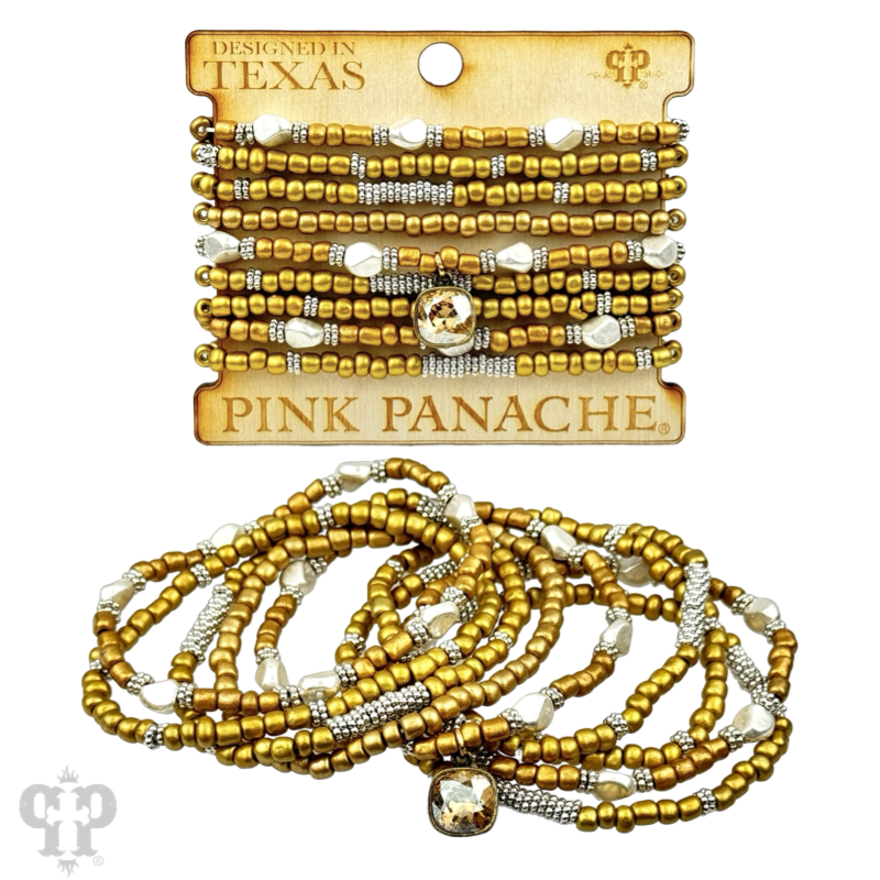 Stacked pony bead bracelet with gold, silver, and white beads from Pink Panache Brands, featuring a colorful and trendy design.