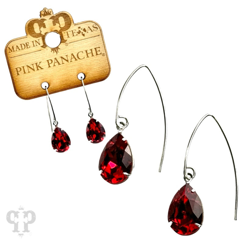 Blue and gold Austrian crystal pear drop earrings by Pink Panache Brands featuring elegant dangling design and sparkling crystals.