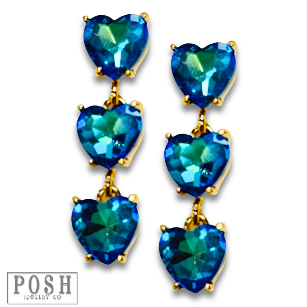 Pink Panache Brands triple heart rhinestone earrings featuring blue sparkling hearts and elegant design.