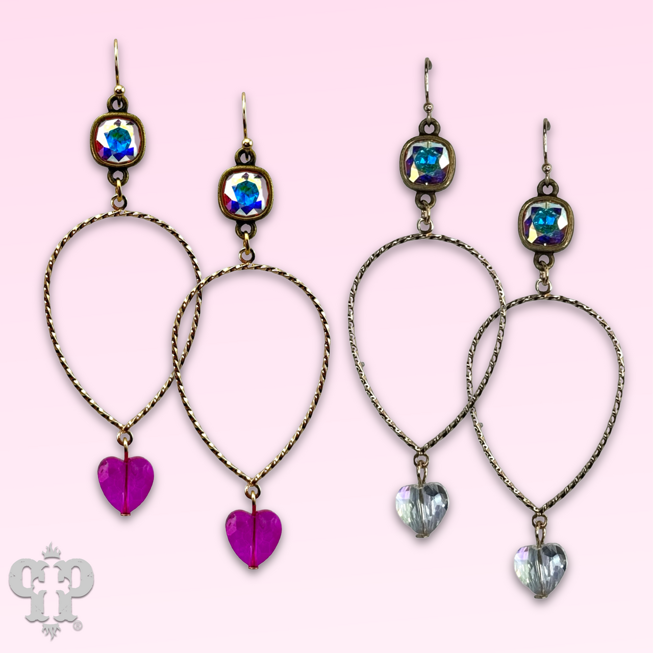 Pink Panache Brands crystal heart teardrop earrings with vibrant fuchsia Austrian crystals and elegant silver hooks.