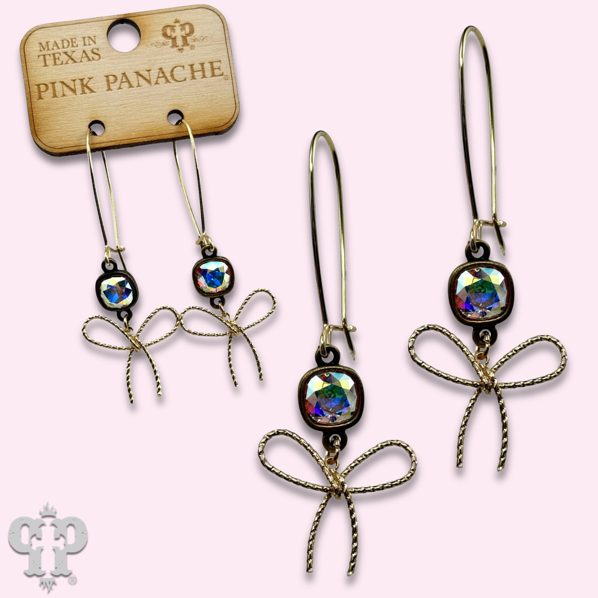 Gold textured bow earring with Austrian crystal from Pink Panache Brands, showcasing elegant design and sparkling details.