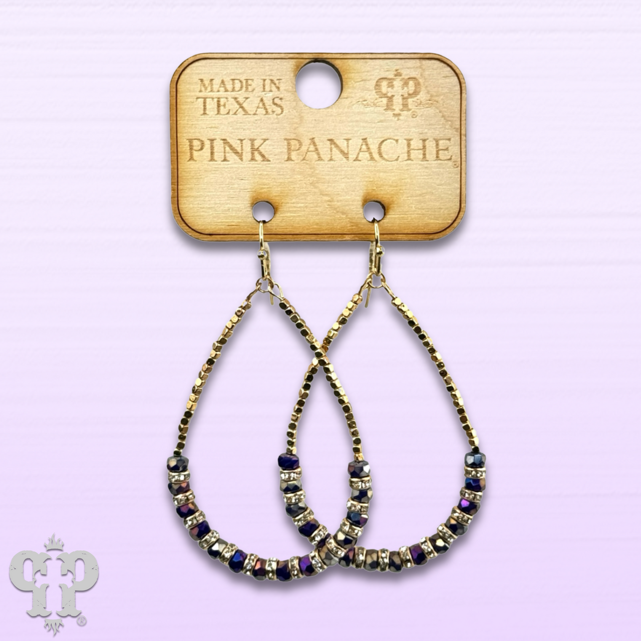 Faceted purple crystal bead teardrop earrings by Pink Panache Brands, showcasing elegant dangling design with sparkling crystal details.