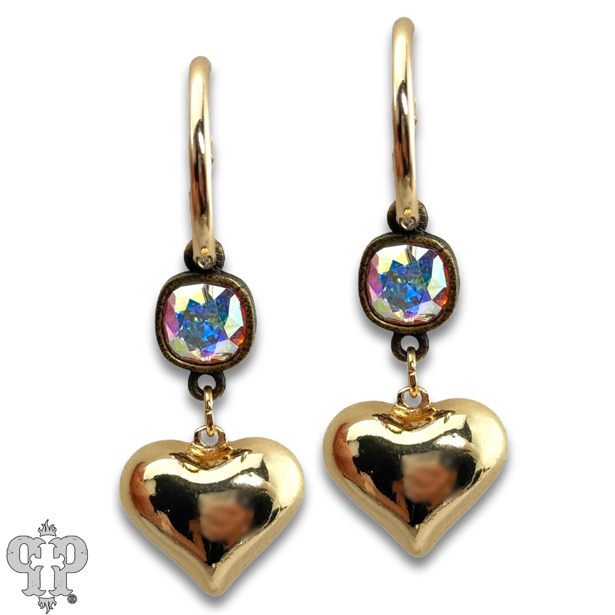 Silver puffed heart earring with sparkling Austrian crystals by Pink Panache Brands, close-up view of the elegant jewelry design.