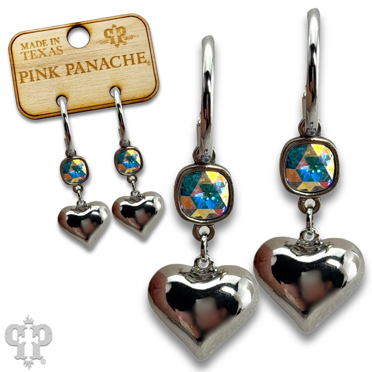 Silver puffed heart earring with Austrian crystal from Pink Panache Brands, showcasing a shiny, detailed jewelry design.