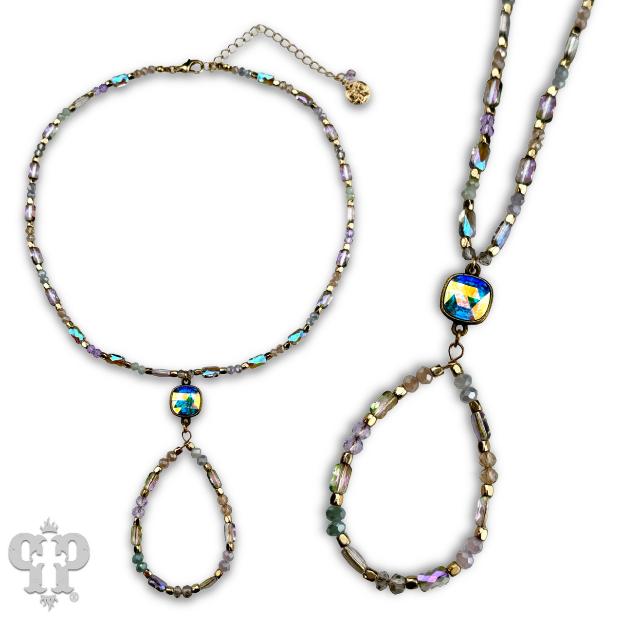 Purple bead and teardrop necklace with Austrian crystals by Pink Panache Brands, featuring elegant purple accents and sparkling details.