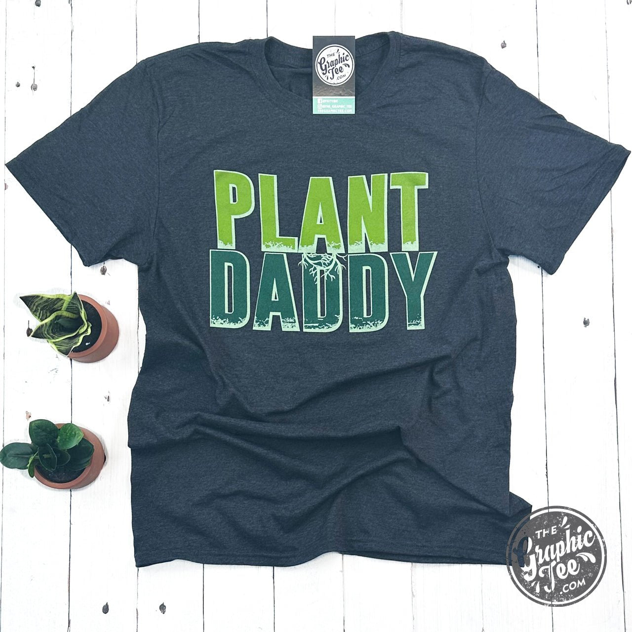 Plant Daddy short sleeve graphic tee from The Graphic Tee featuring a plant-themed design on soft cotton fabric.