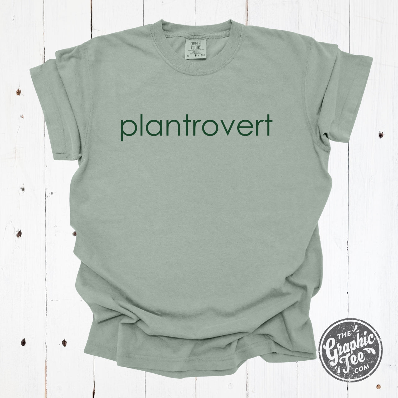 Plantrovert round pigment dyed graphic T-shirt from The Graphic Tee, casual short-sleeve tee with plant-themed design.