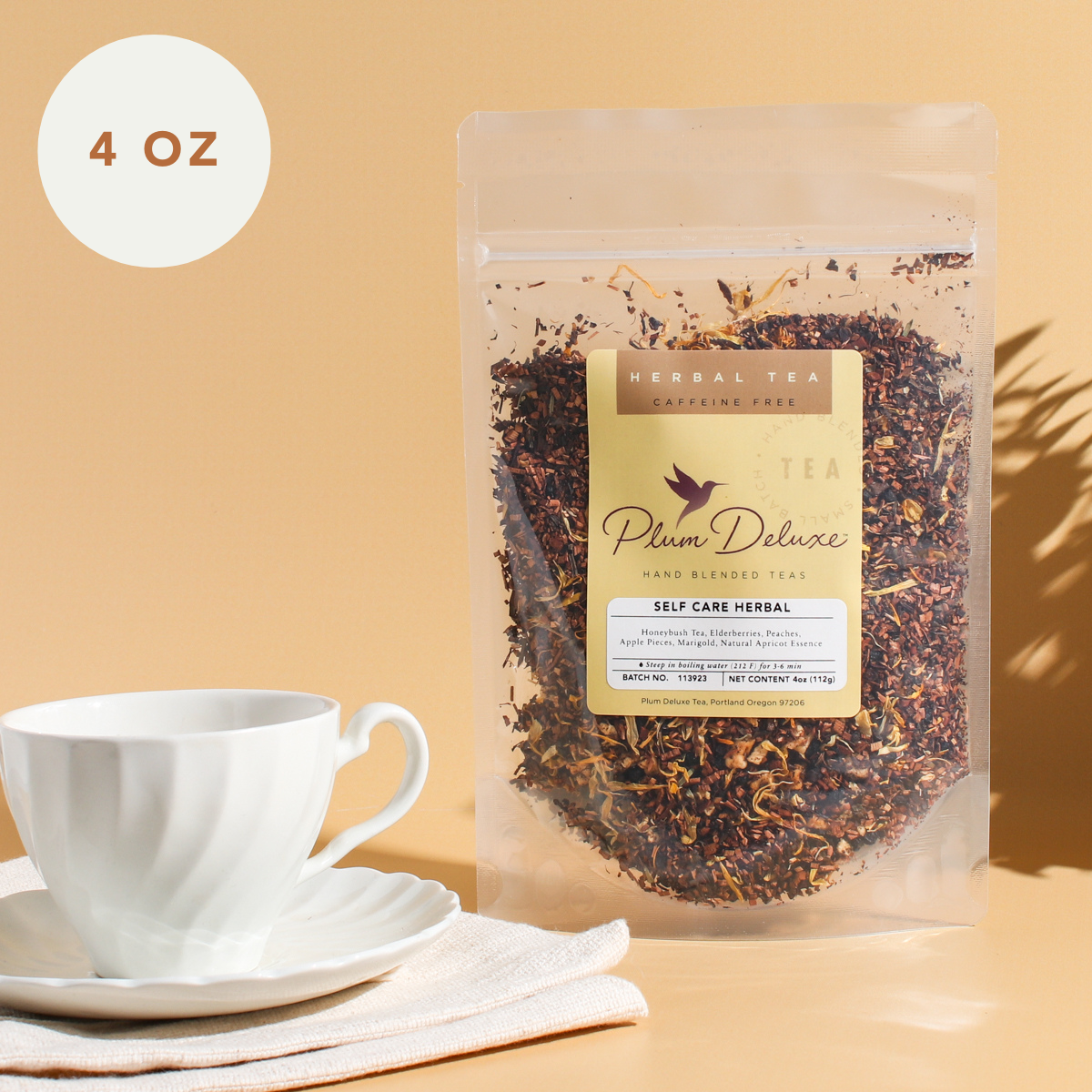 A 1 oz package of Plum Deluxe Tea's The Self Care Blend with elderberry and apricot flavor, featuring a colorful label design.