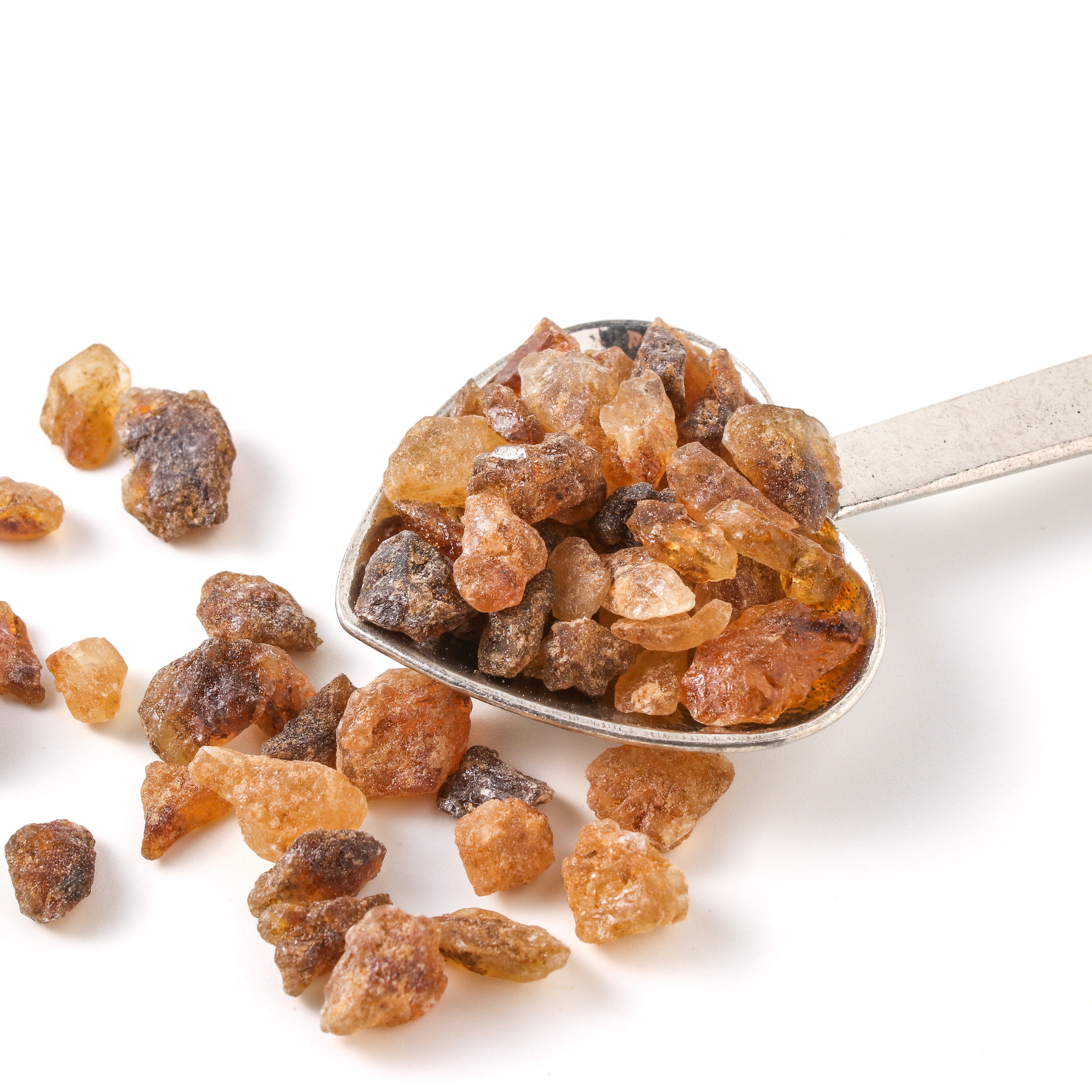 Plum Deluxe Tea Deluxe Tea Sugar rock sugar for tea in a clear glass jar, fine white rock sugar crystals for sweetening tea.