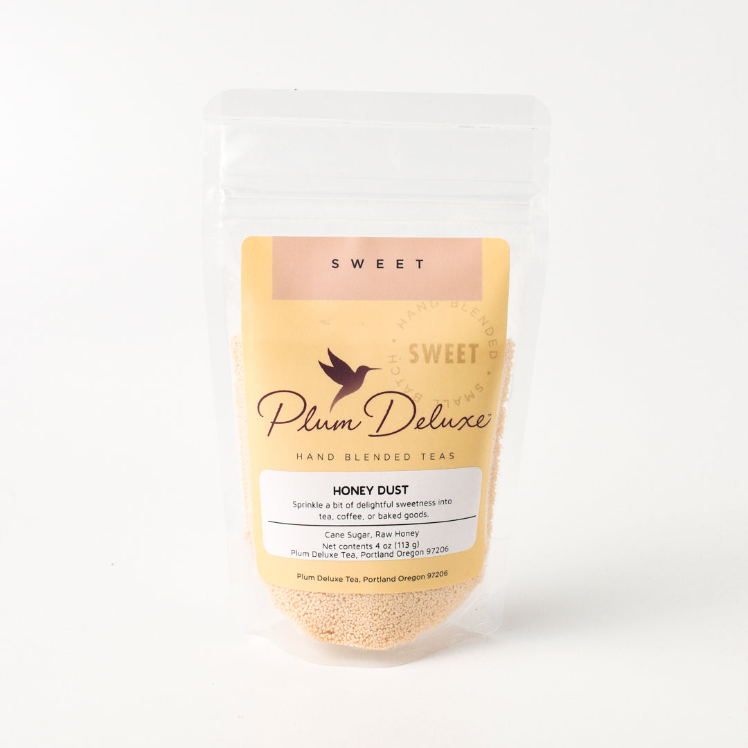 Plum Deluxe Honey Dust with cane sugar and raw honey in a 4 oz package, fine granulated sweetener with natural golden color.