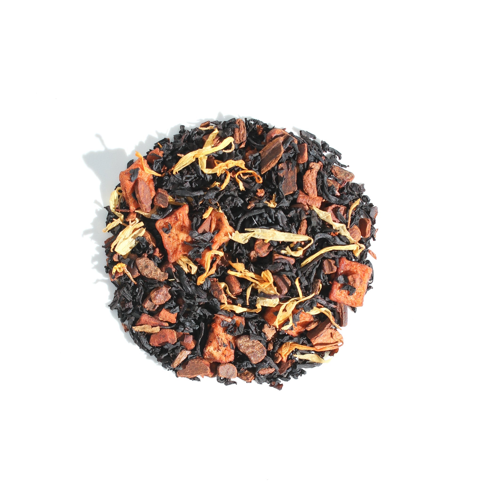 Plum Deluxe Tea Cinny Roll Black Tea with caramel, apple, and cinnamon flavors in a tea package, showcasing the product label.