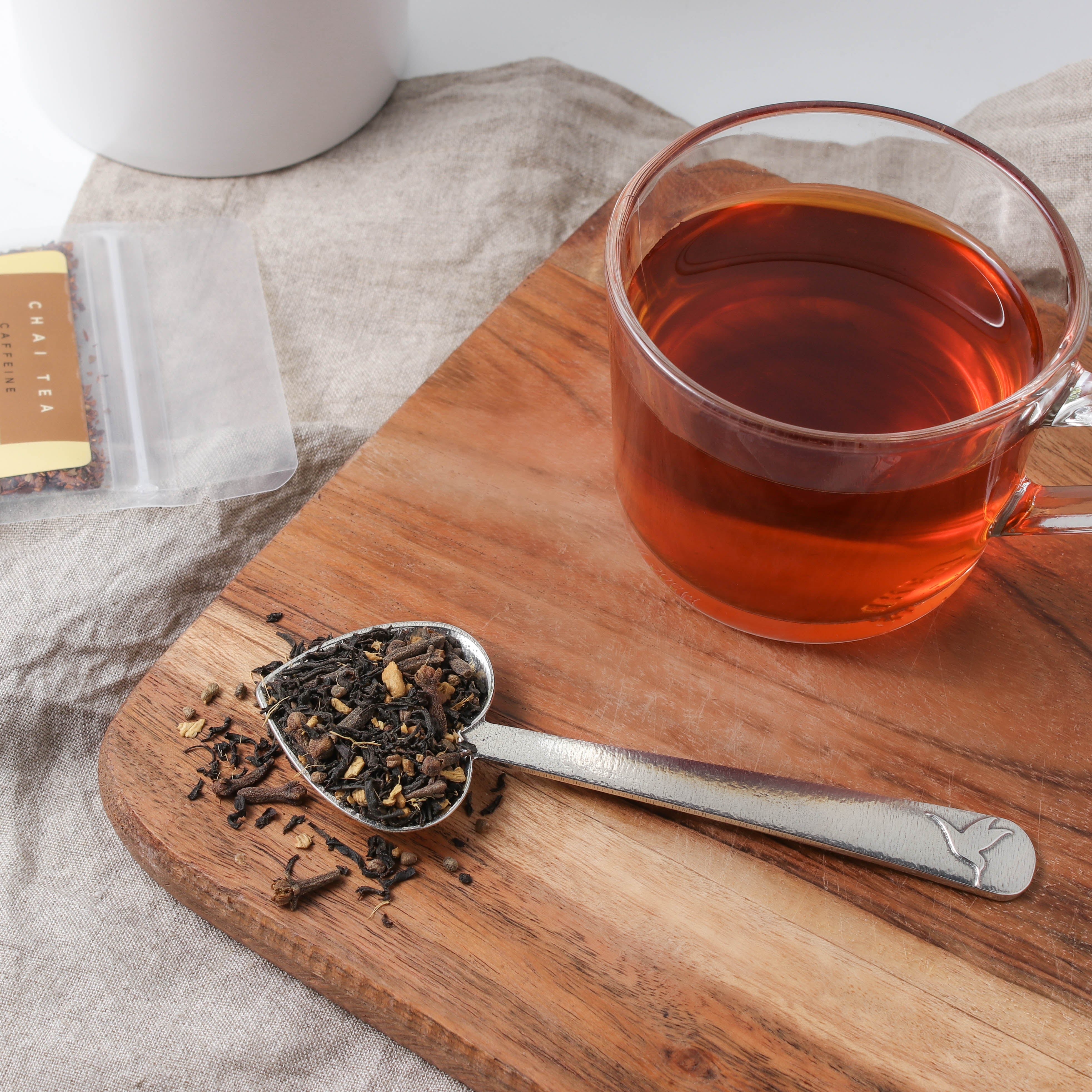 Heirloom Heart Pewter Tea Scoop from Plum Deluxe Tea, featuring a detailed heart-shaped design for measuring loose leaf tea.