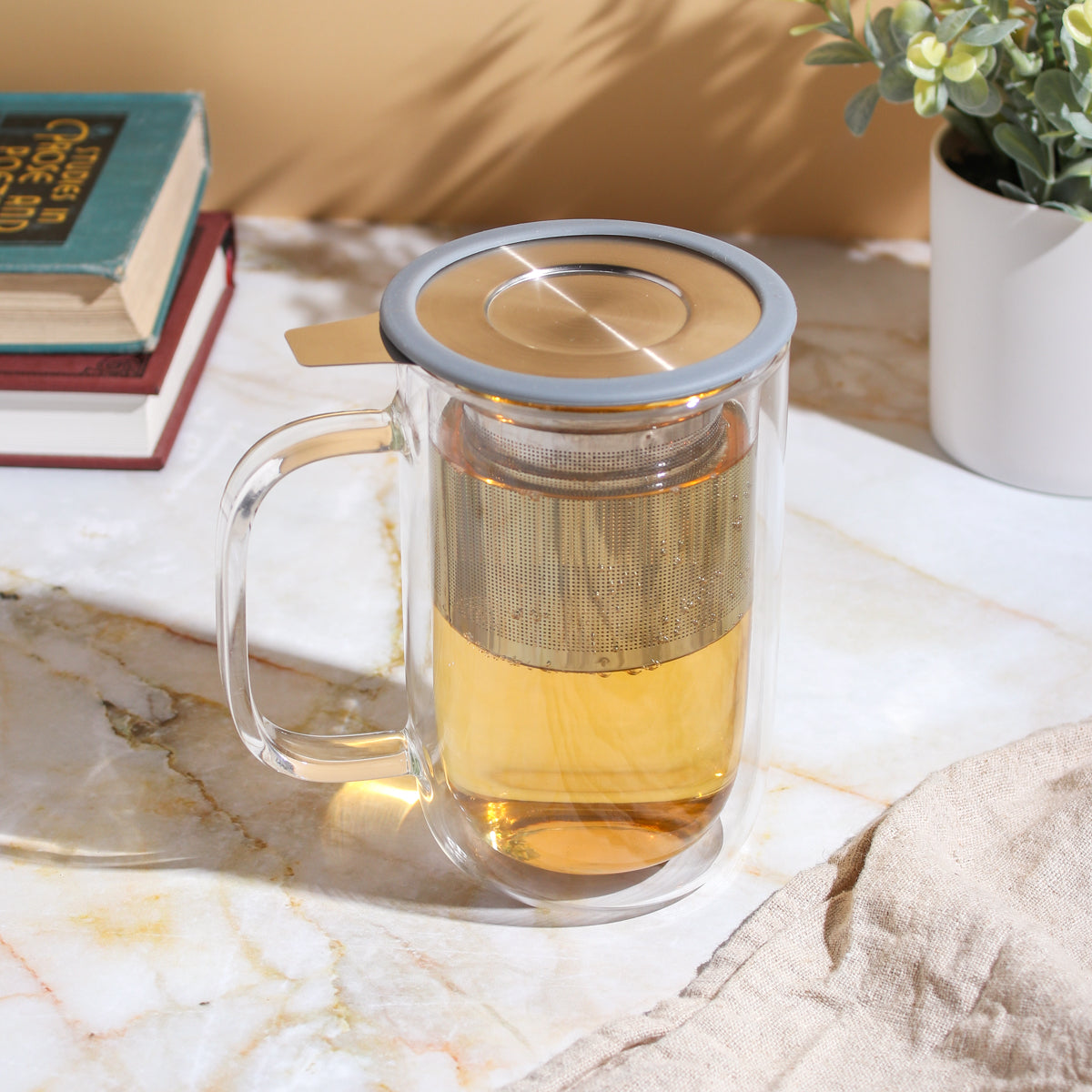 Plum Deluxe Perfect Tea Mug with infuser and lid, ceramic tea mug for steeping loose tea leaves.