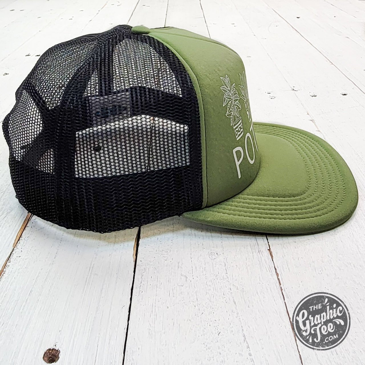Pothead Foam Trucker Cap by The Graphic Tee featuring a structured front and mesh back for a casual, stylish look.