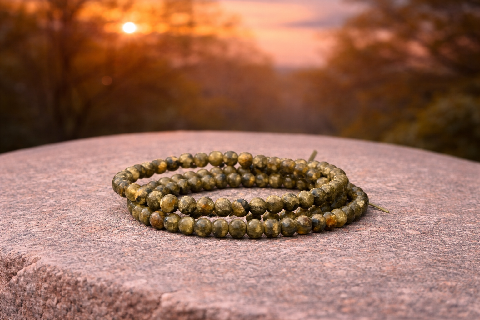 Natural Peridot stone crystal energy bracelet showcasing vibrant green gemstones on a delicate elastic band.