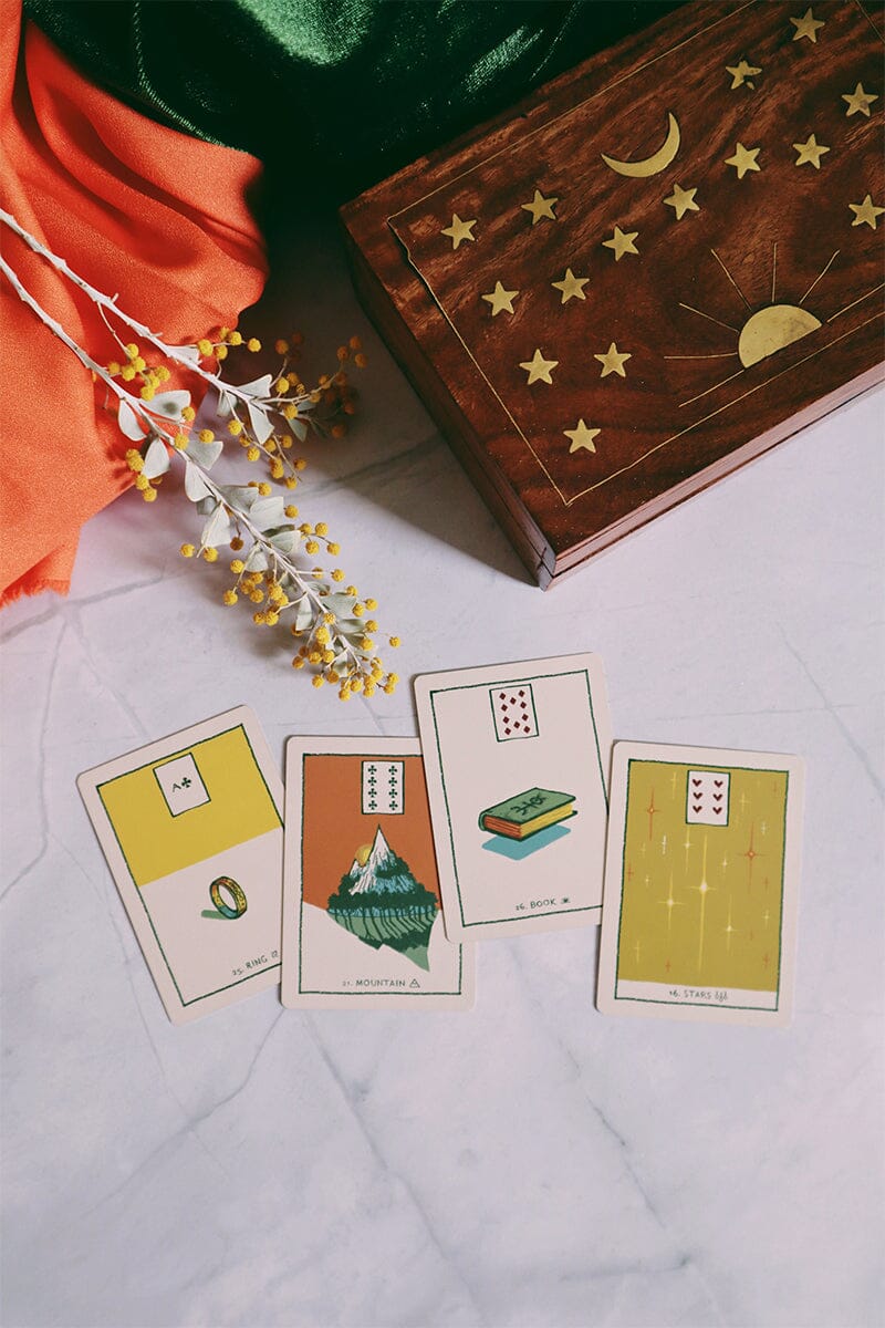 Green Glyphs Lenormand deck by Prisma Visions featuring intricate green and black card designs for divination and fortune-telling.