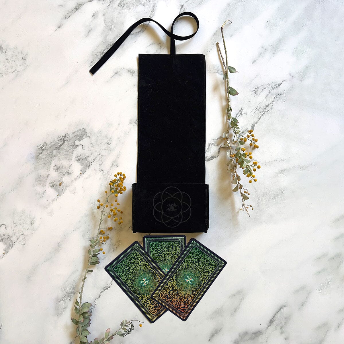 Prisma Visions Mirra Visions Satchel deck featuring colorful, artistic tarot cards laid out for display.