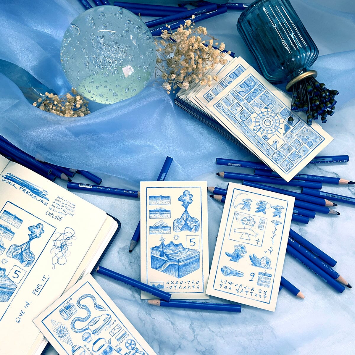 Prisma Visions The Cerulean Sequence deck featuring vibrant, blue-themed card illustrations for tarot or oracle card reading.
