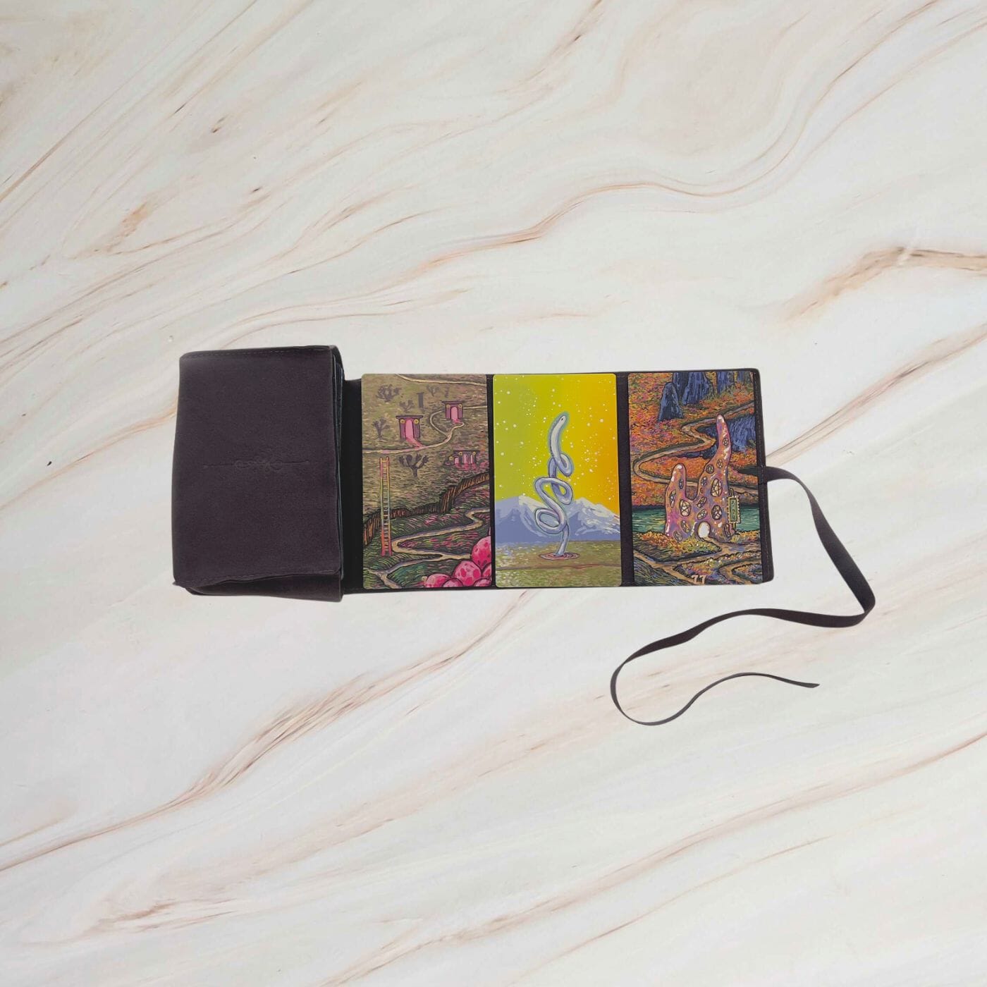 Prisma Visions Many Paths Satchel with adjustable straps, multiple compartments, and colorful textured leather design.