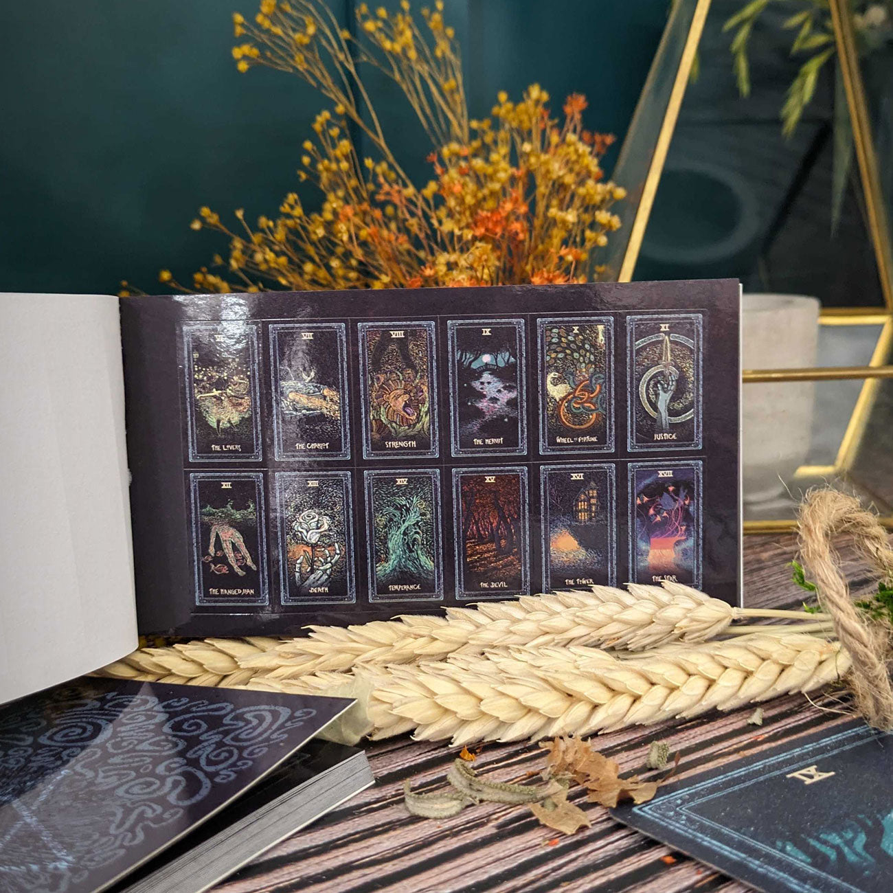 Prisma Visions Tarot sticker book featuring colorful, artistic tarot card stickers on pages for creative crafting and decoration.