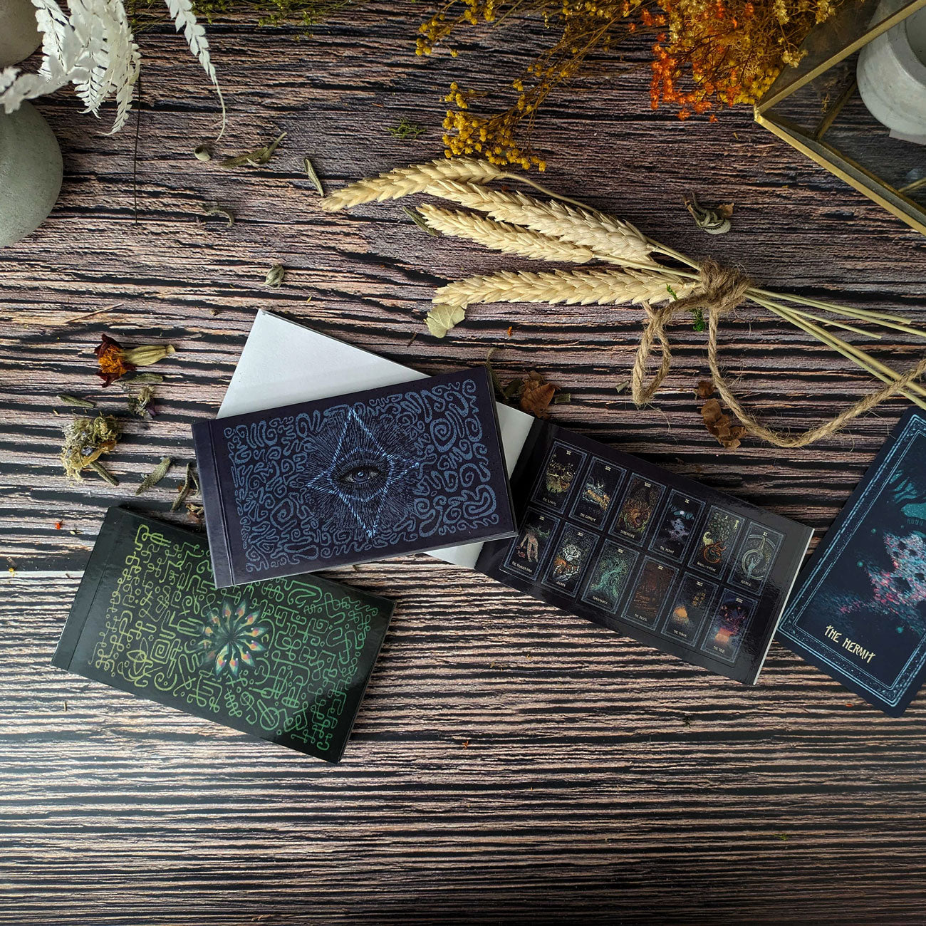 Prisma Visions Tarot sticker book with colorful tarot card illustrations and artistic sticker designs.
