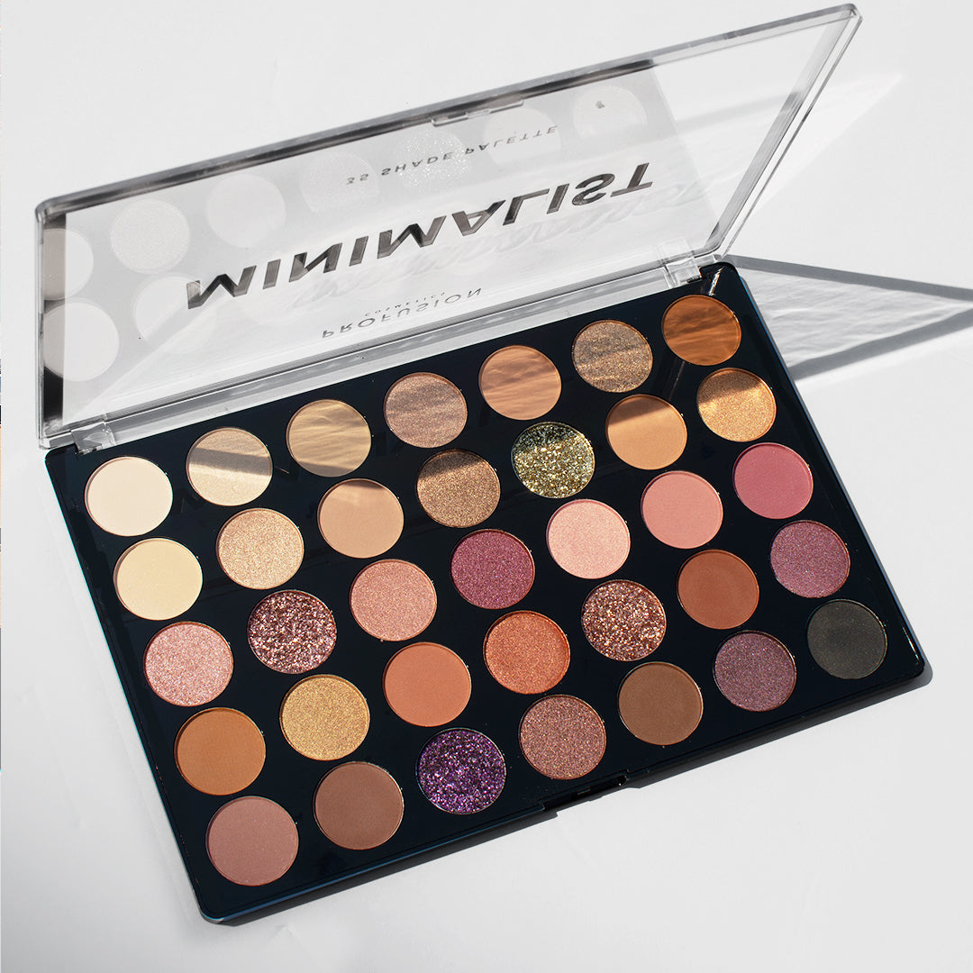 Profusion Cosmetics minimalist 35 shade palette with neutral and vibrant eyeshadow colors displayed in a sleek compact.
