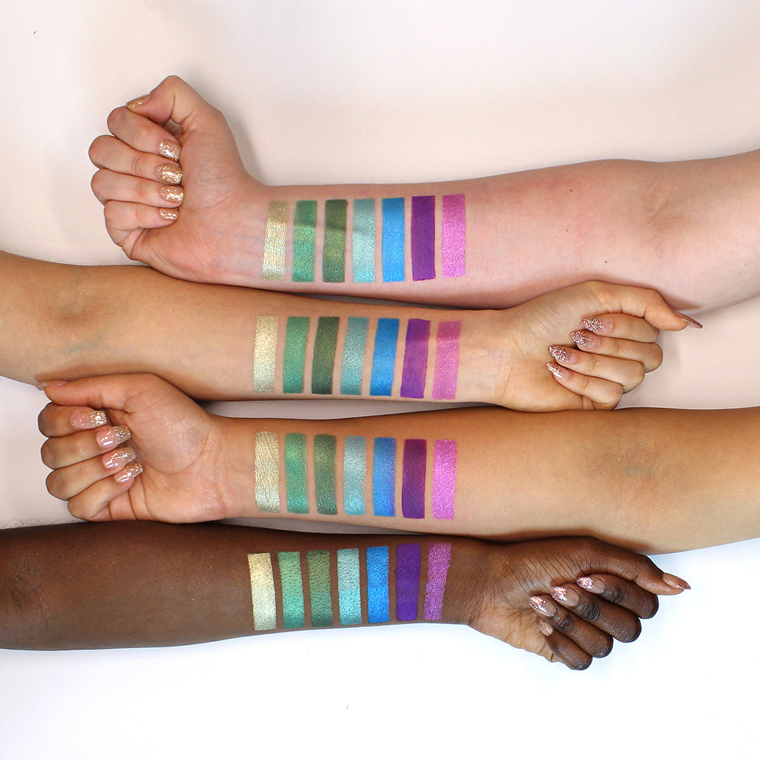 Wanderlust eyeshadow palette by Profusion Cosmetics with vibrant, colorful shades in sleek packaging.