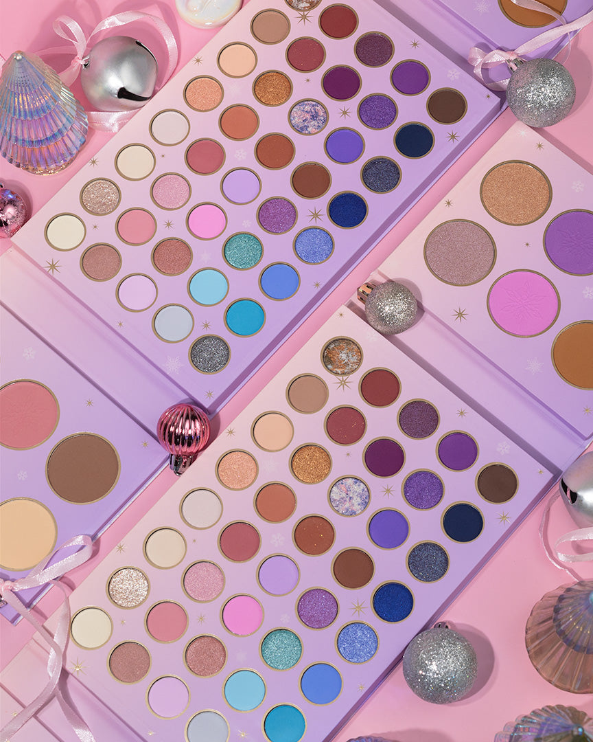 Profusion Cosmetics Frosted Snow Sparkle 52-shade face and eye palette with shimmering eyeshadows and face highlighters.
