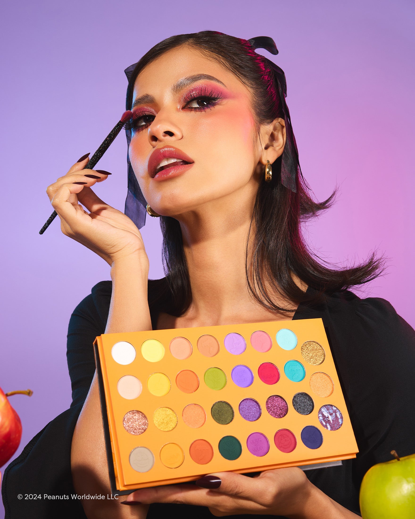 Profusion Cosmetics Peanuts Halloween Trick or Treat 31-shade eye palette with colorful eyeshadows and themed packaging.