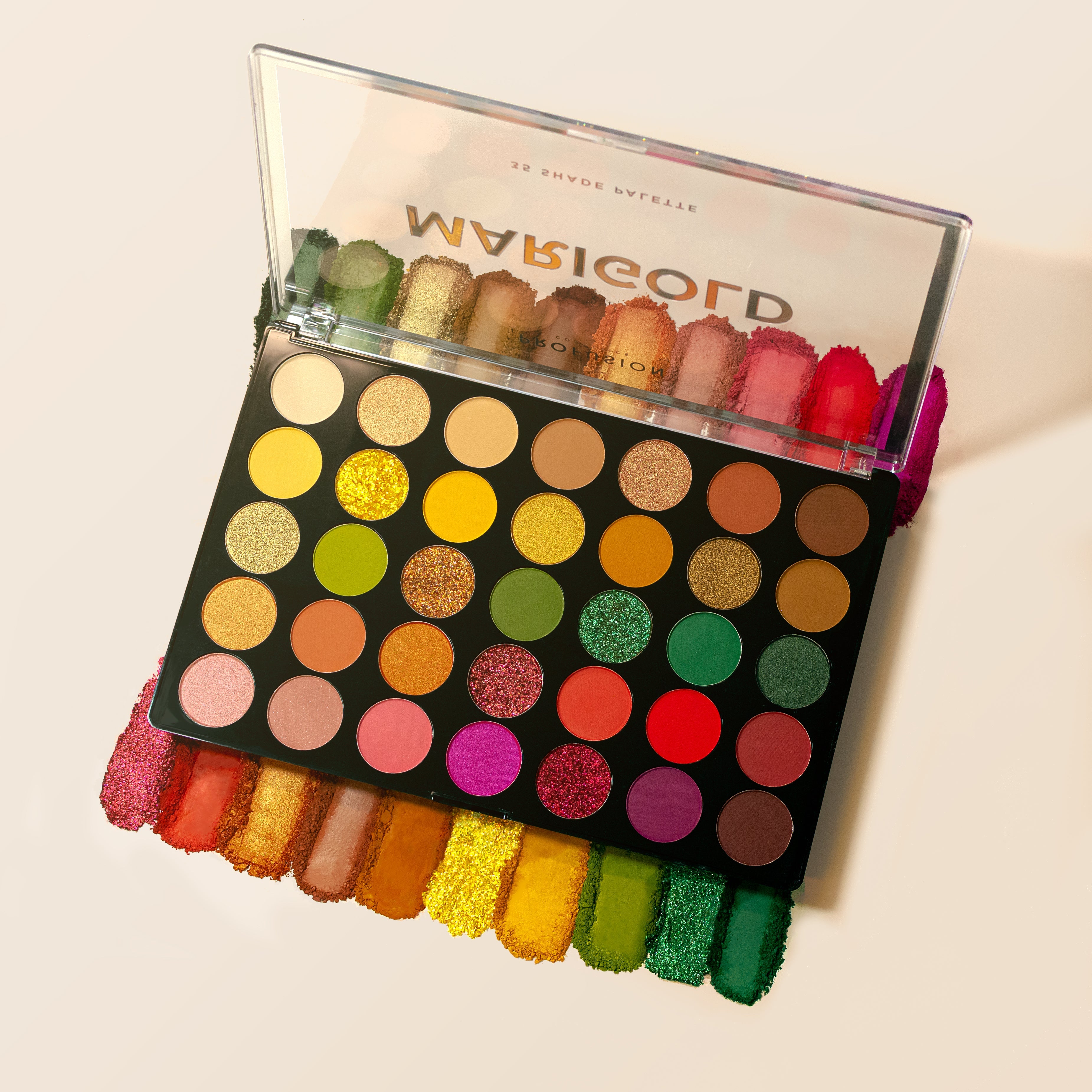 Profusion Cosmetics Marigold eyeshadow palette with warm orange and gold tones, displayed open showcasing vibrant eye makeup.