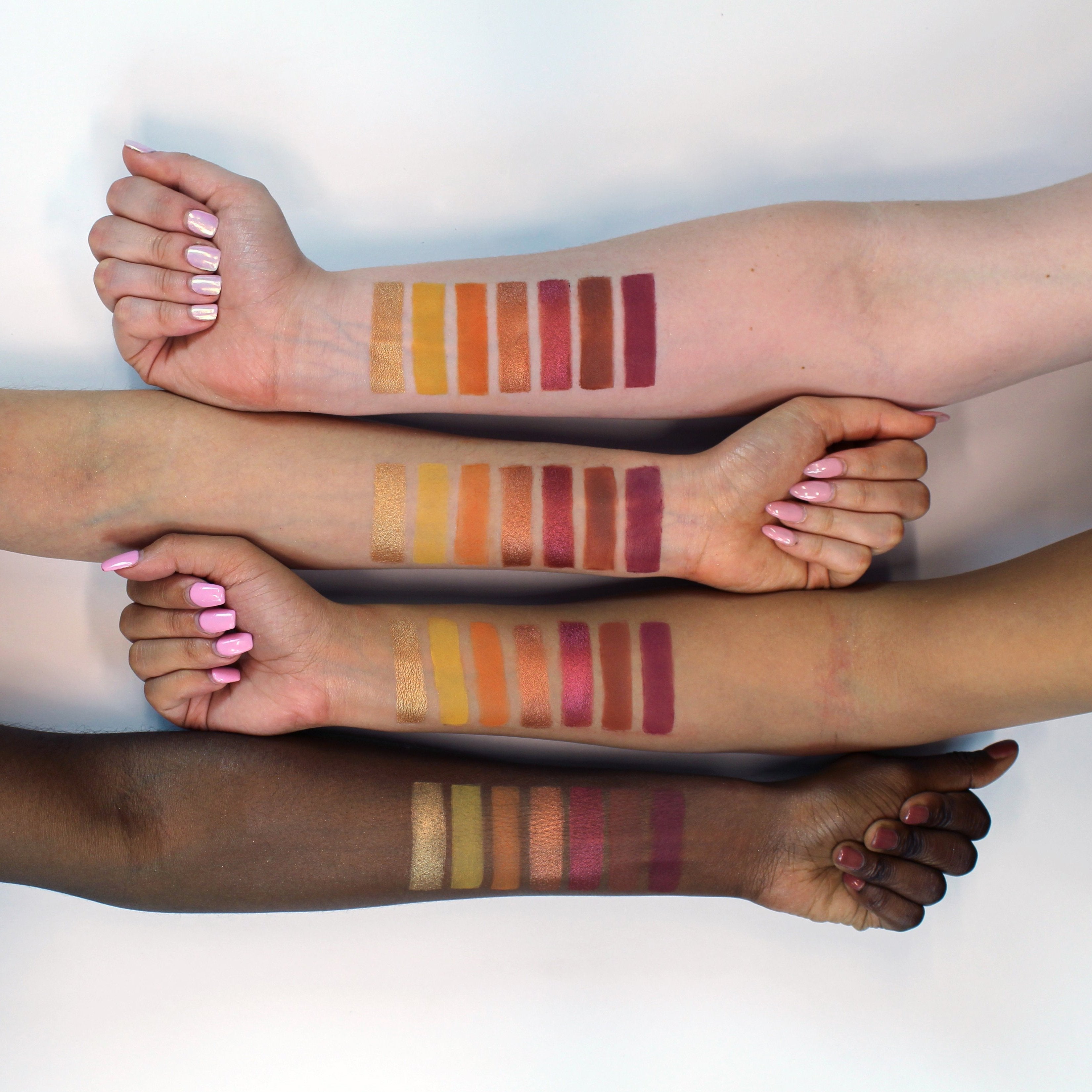 Profusion Cosmetics Siennas eyeshadow palette with warm-toned shades and eye makeup swatches on skin.