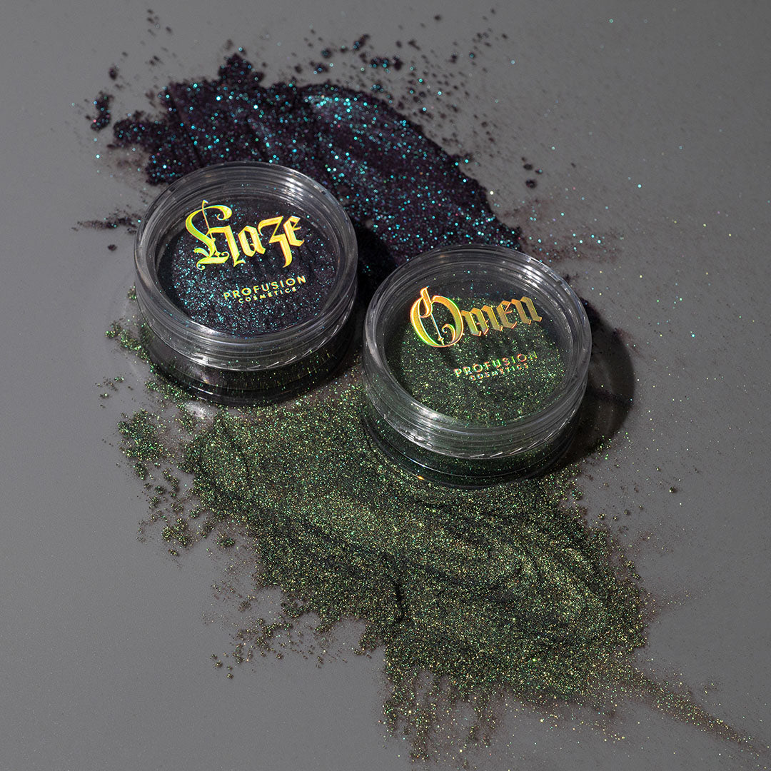 Eyeshadow in Enchanted Forest Dragon Duochrome Mineral Pigment by Profusion Cosmetics, featuring shimmering green and blue hues.
