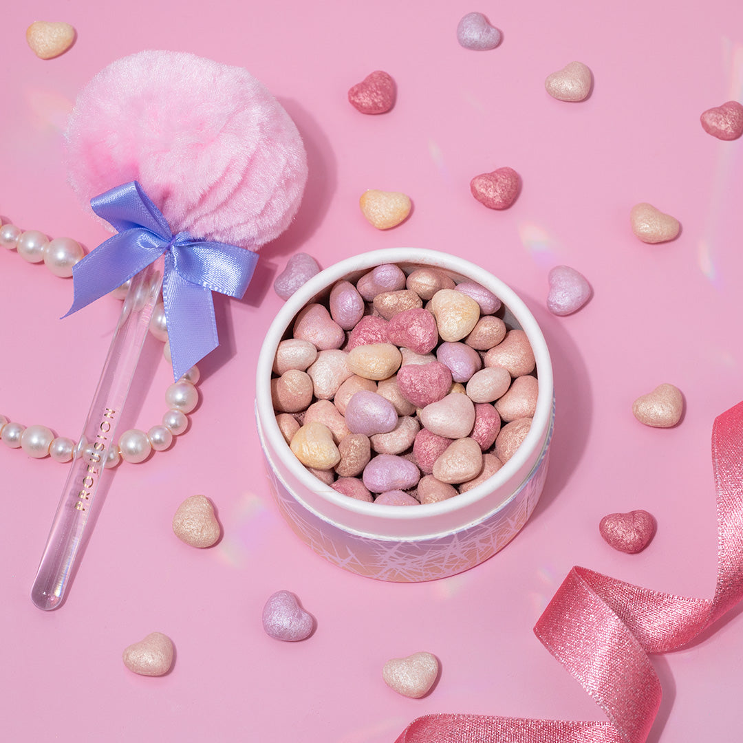 Profusion Cosmetics Frosted Snow Sparkle face powder puff set with twinkling lights design, soft, plush puffs for makeup application.