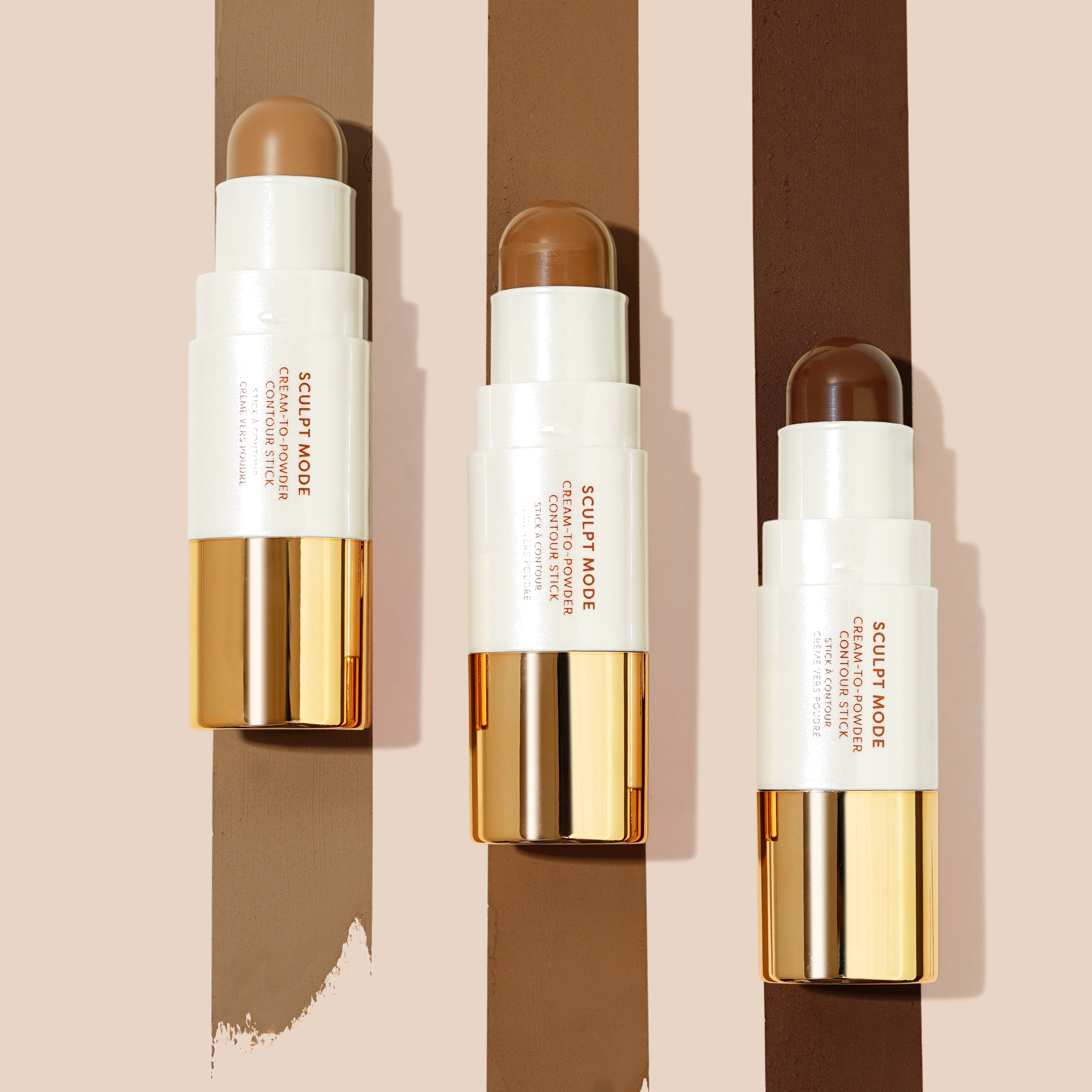 Profusion Cosmetics Sculpt Mode Cream Contour Stick for face, shown with a close-up of the product in hand.