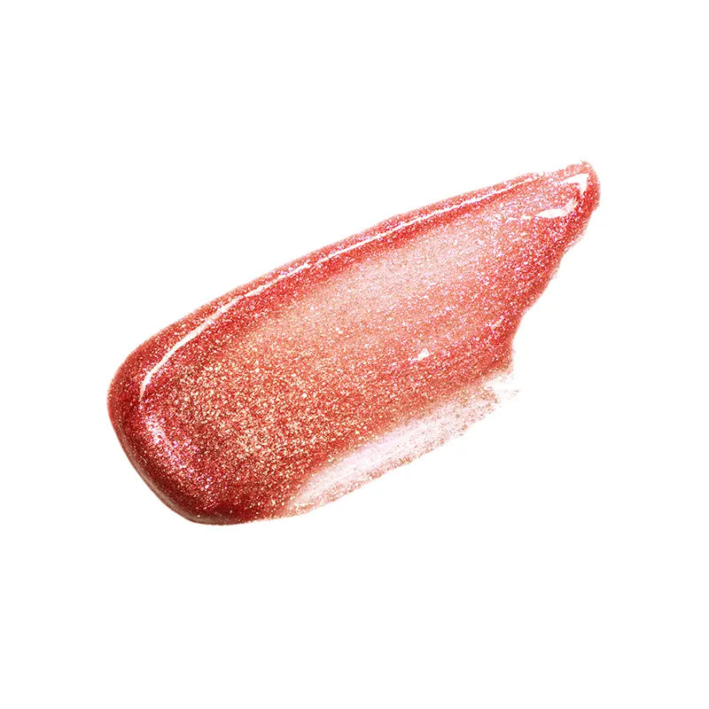 Profusion Cosmetics cinnamon lip syrup on lips, showcasing glossy finish and rich color for smooth, hydrated lips.