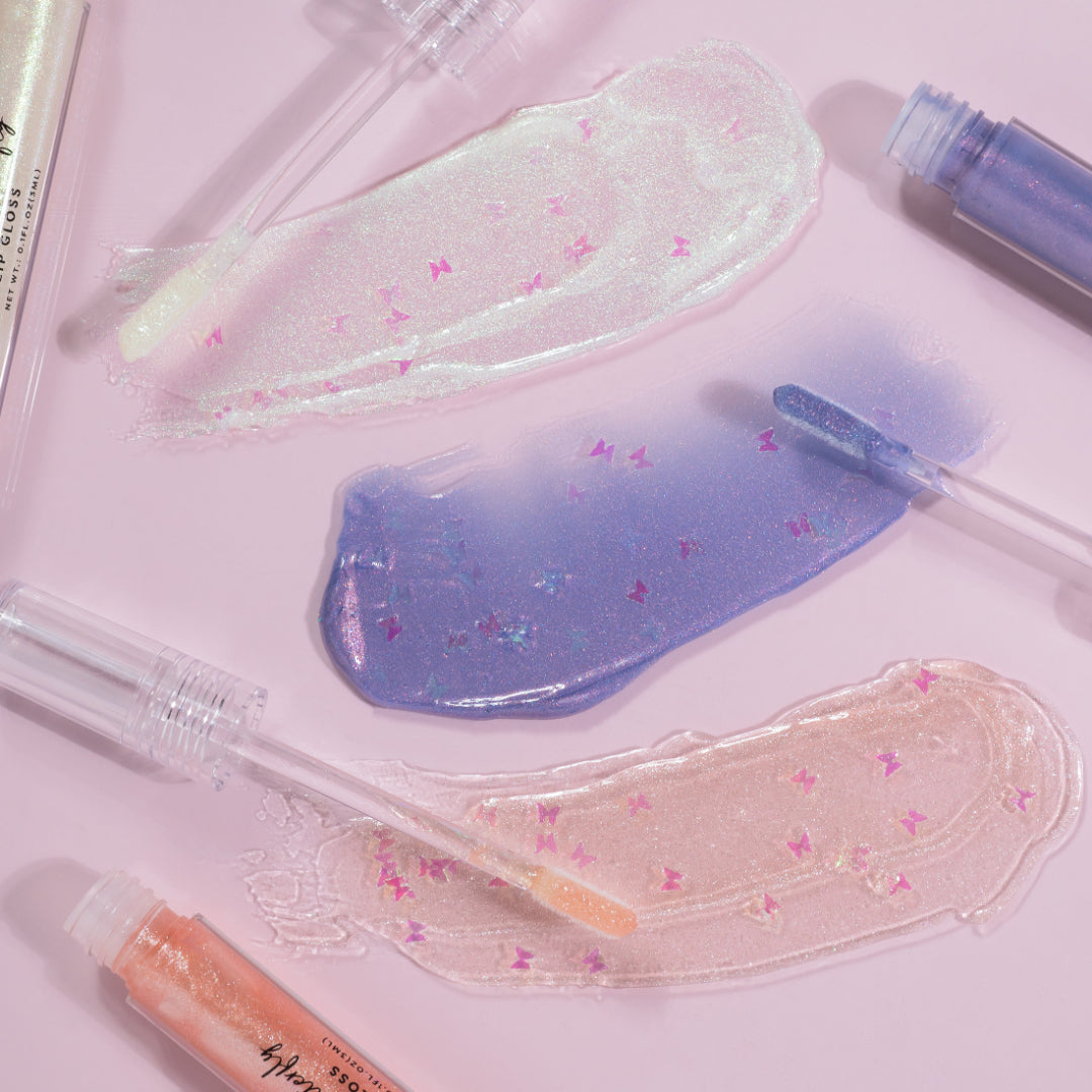 Profusion Cosmetics Empowered Butterfly Glassy Lip Gloss Set featuring shiny, moisturizing lip glosses in vibrant shades