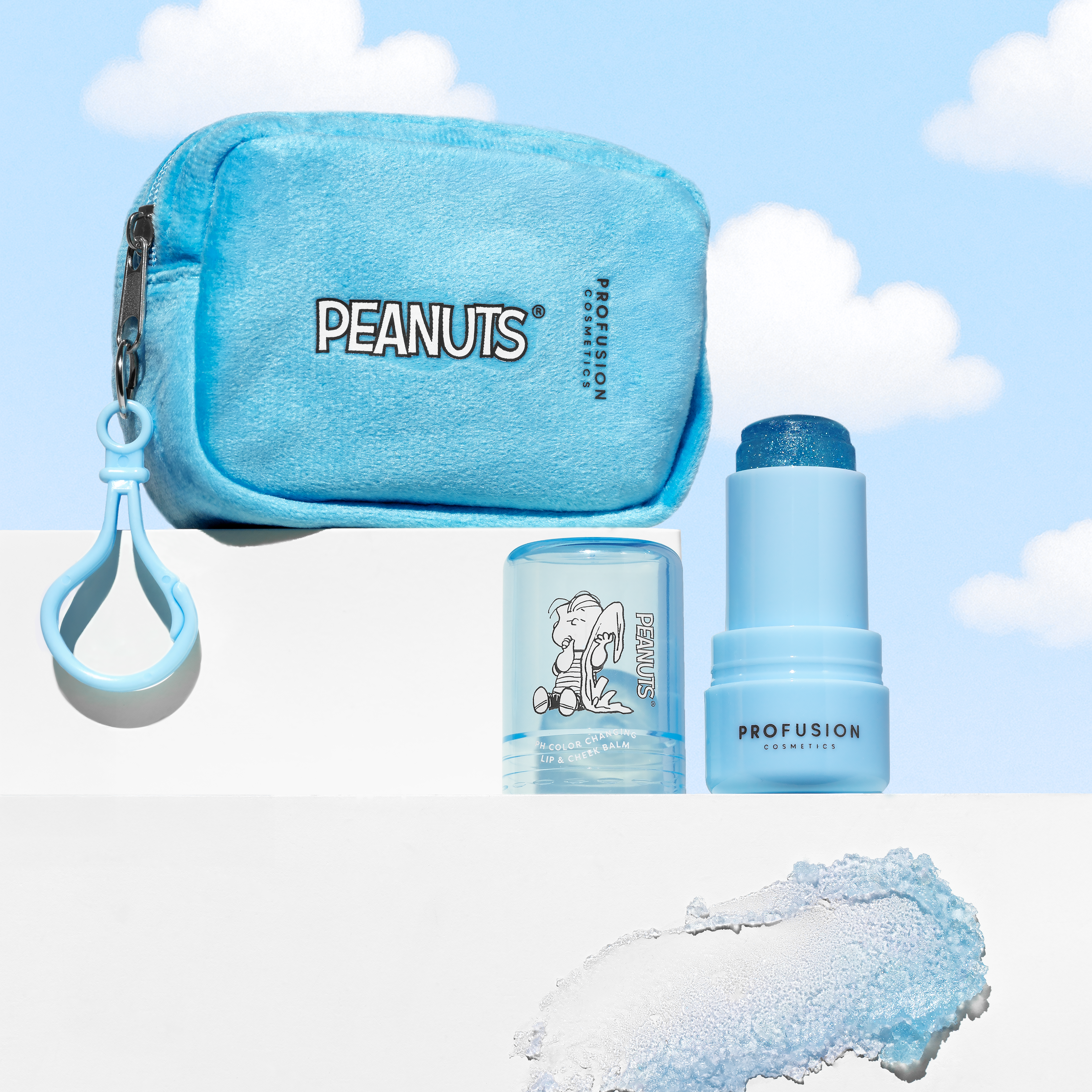 Profusion Cosmetics Peanuts 75th Linus’s Cozy Tint color-changing lip balm with security blanket pouch, featuring Peanuts character design