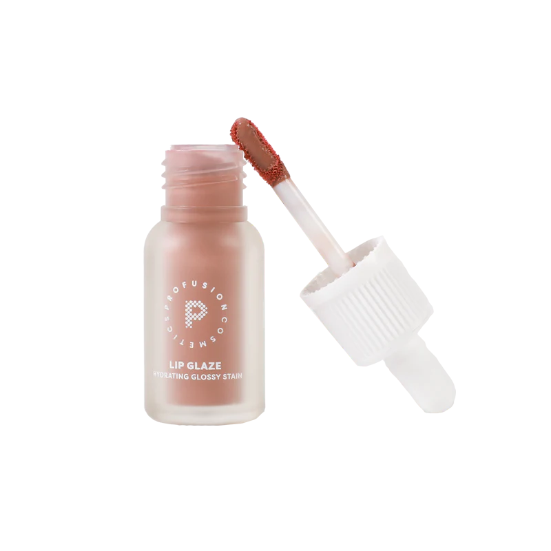 Profusion Cosmetics Lip Glaze Hydrating Lip Stain on lips with a glossy finish and natural maple hue.