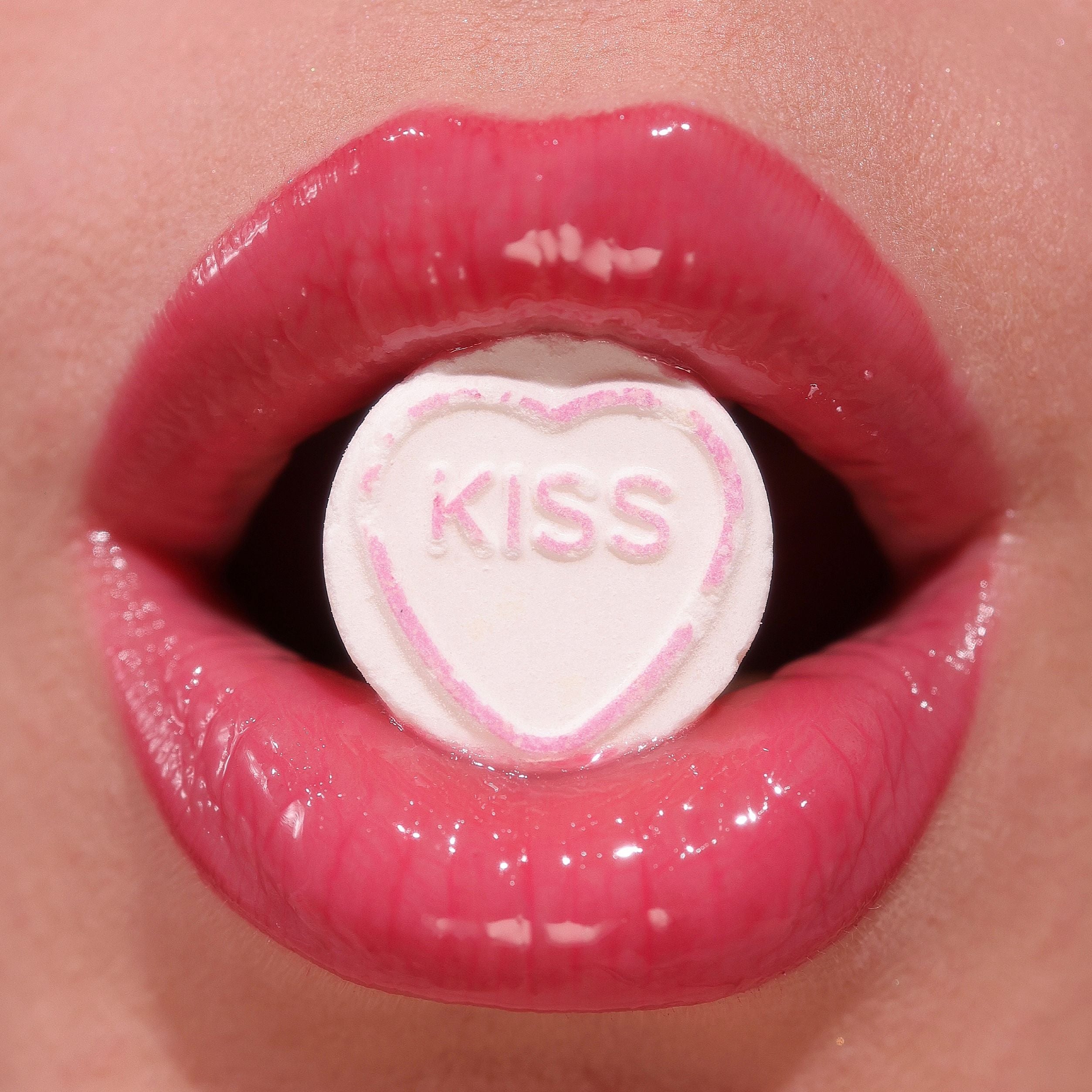Profusion Cosmetics Juicy Lips in Radiant Rose, close-up of glossy pink lipstick on lips.