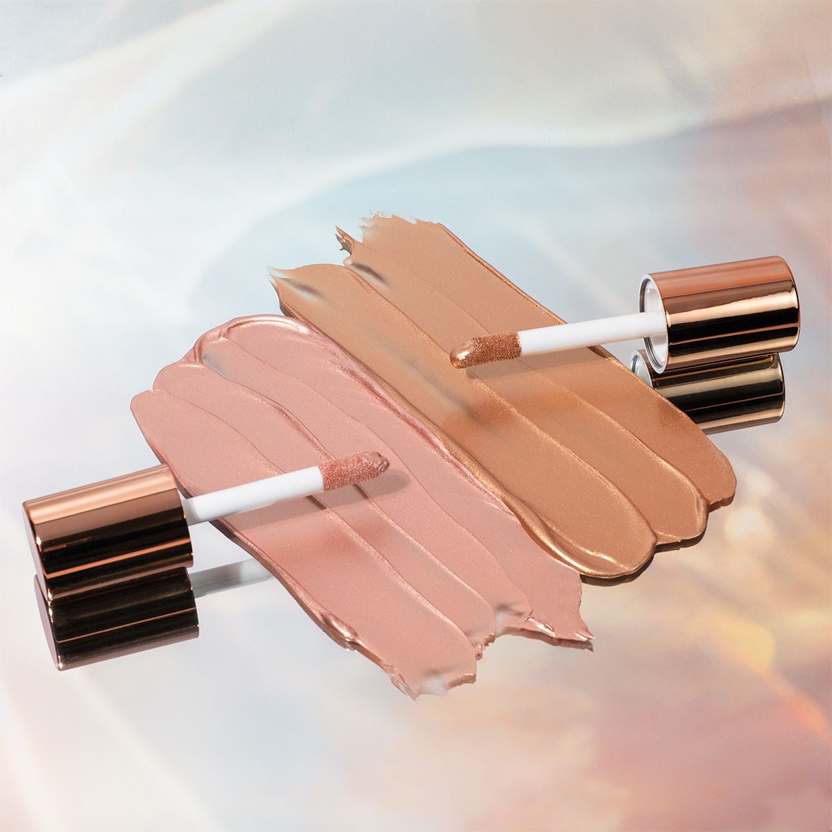 Profusion Cosmetics Radiant Glow Liquid Highlighter in Champagne shade, illuminating and highlighting skin with a luminous finish.