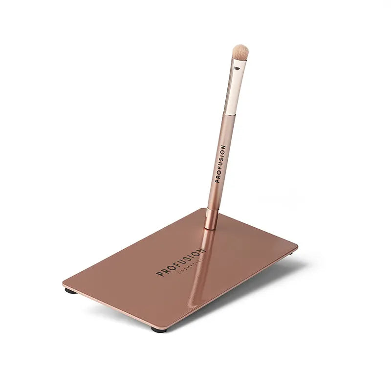 Profusion Cosmetics Magnetix display stand with eyeshadow makeup brushes arranged for easy access and application.